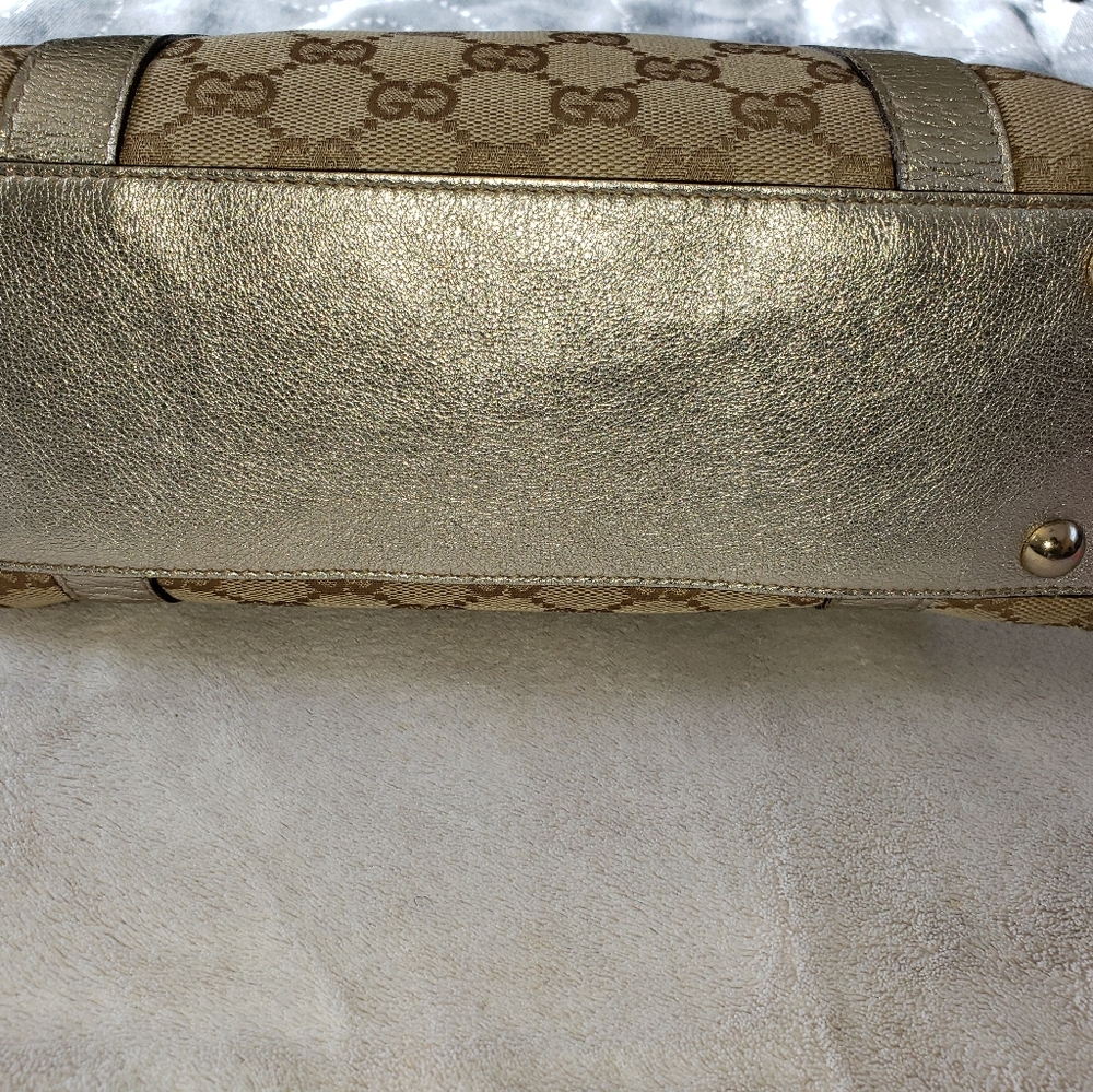 Gucci GG Abbey bag with metallic gold trim